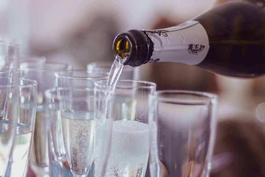 Image of prosecco being poured.